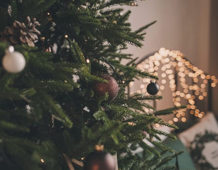 beautifully decorated Christmas tree with balloons in a cozy home environment