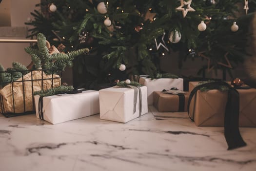 Christmas holiday composition with gift boxes under the tree