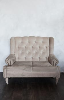 Old classic armchair in the interior. minimalism