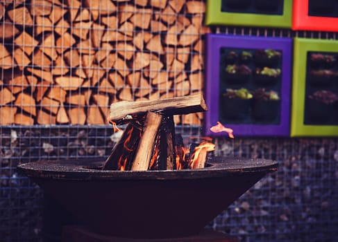 burning wood in the yard. fire and flame