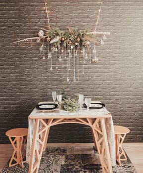 Christmas decoration of the living room-new year's table with Cutlery. preparing for the holiday
