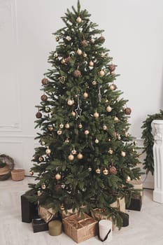 beautiful Christmas tree decorated with balls and garlands