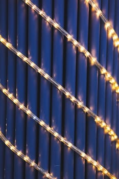 Christmas garland on the pillar of the city. night scene