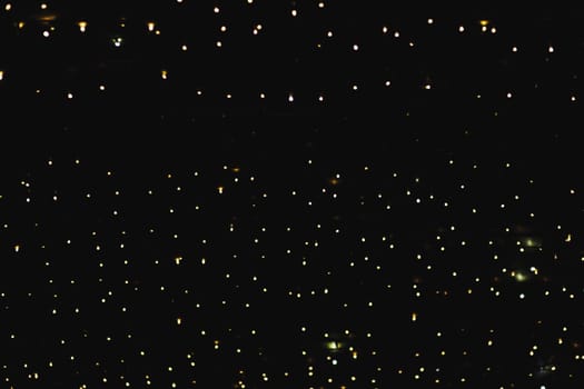 abstract Christmas lights garland on dark background