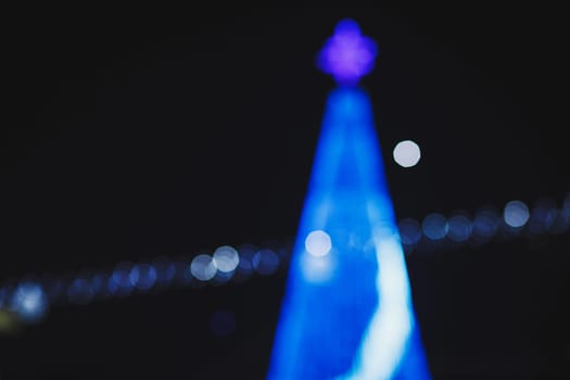 Blurred blue bokeh light background, Christmas and New Year holidays background