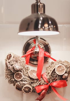 Christmas interior room with modern lamp decorative red ribbon and tree in home.