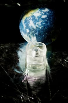 Perfume near layout earth. texture. concept of freshness and ecological