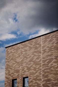 Modern bricks building with sky background