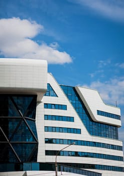 Modern office building, luxury hotel over blue sky