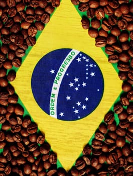 Aroma roasted coffee beans on flag of Brazil. arabica beans