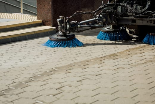 Sweeper machine cleaning. Concept clean streets from debris.