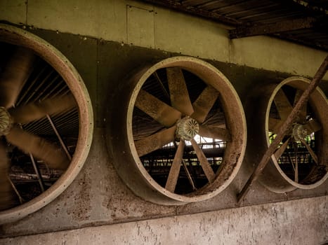 A row of The Old exhaust fans from the livestock house