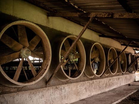 A row of The Old exhaust fans from the livestock house