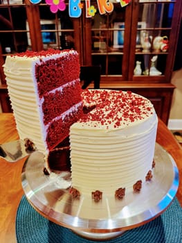 Serving a Slice of Red Velvet Cake in Cozy Home Setting, Fort Wayne, Indiana, 2022