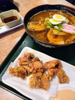 Delicious Japanese ramen and karaage served in a trendy San Francisco restaurant, California 2023