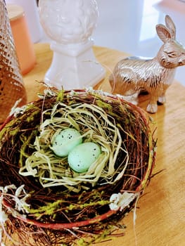 Springtime Rustic Decor with Blue Eggs in Bird's Nest, Silver Deer Figurine and Ceramic Vase, Louisville, Kentucky 2023