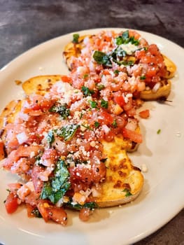 Fresh Bruschetta on White Plate, Rustic Italian Cuisine, Fort Wayne 2023