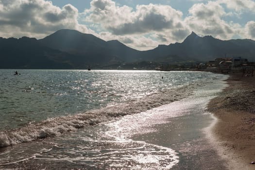 Beach Relaxation at the Black Sea. Fairy-tale Moments of a Sunny Day. The concept of tourism and sea travel.