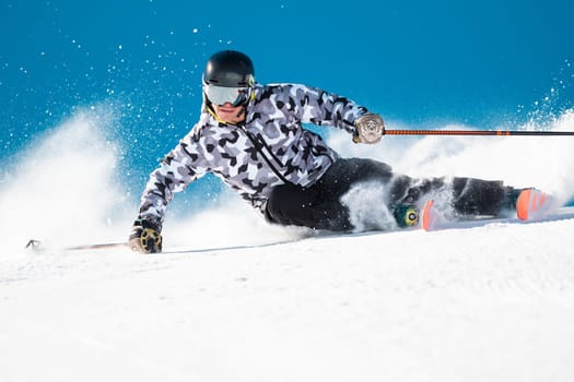 Expert skier on the slopes of Grandvalira in Andorra in Winter 2024.