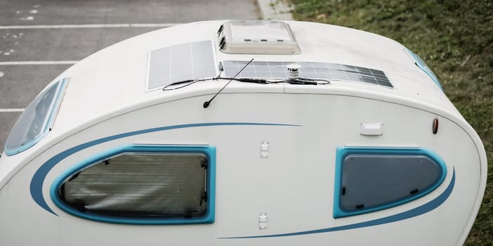 Travel trailer camping in parking. tourism