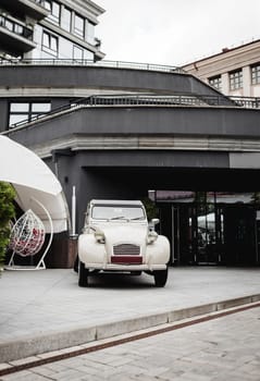 vintage car near a street cafe or hotel