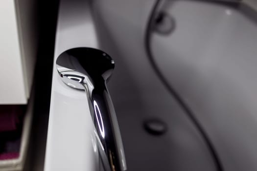 stainless steel hand shower heads are attached to a wall-mount and flexible hose, providing freedom to focus the shower spray to desired body parts.