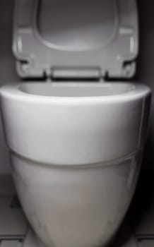 New white toilet bowl in a bathroom