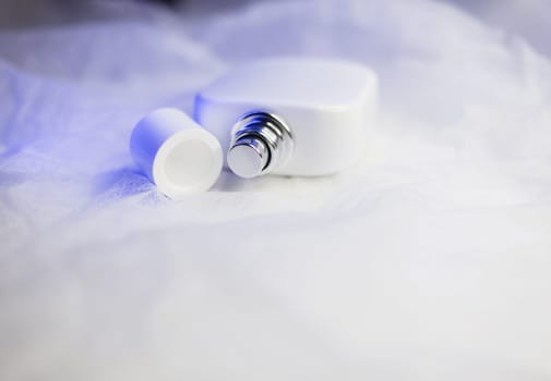 Female fragrance. White perfume bottle. aromatherapy
