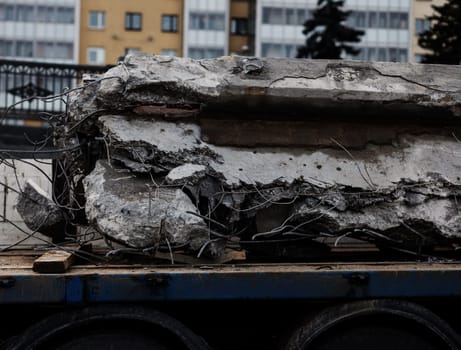 fragments of old worn-out concrete with reinforcement