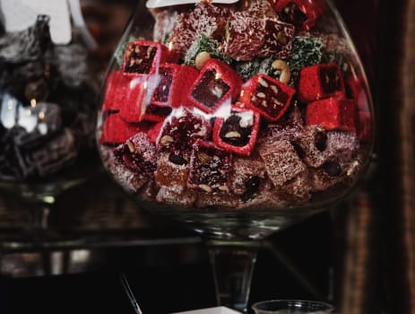 Assorted Turkish delights on glass stand. arabic sweets