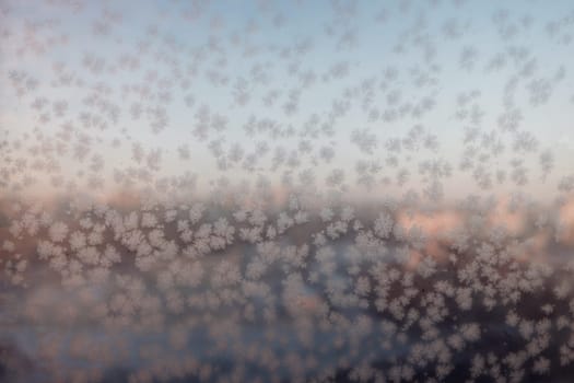 winter rime background. Ice on a window