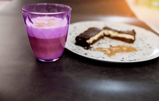 Hot coffee and chocolate cake with dark chocolate glaze. food photography