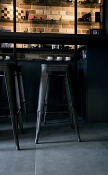 Bar with stools in loft interior