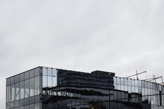 Abstract fragment of modern architecture, walls made of glass