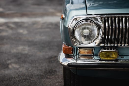 Classic car headlights. Vintage automobile