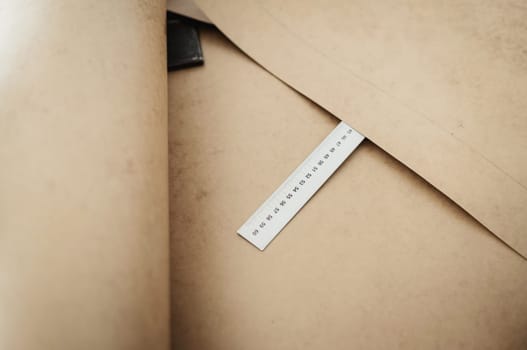 Tailor designer workplace concept. measure and paper with drawings