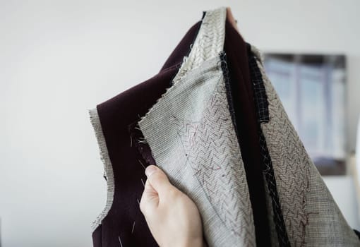  tailor working in atelier, textile industry, hobby, workspace