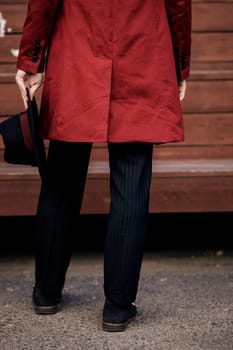 elegant red coat on a man. rear view