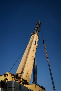 Truck crane at a construction site.  Mobile crane