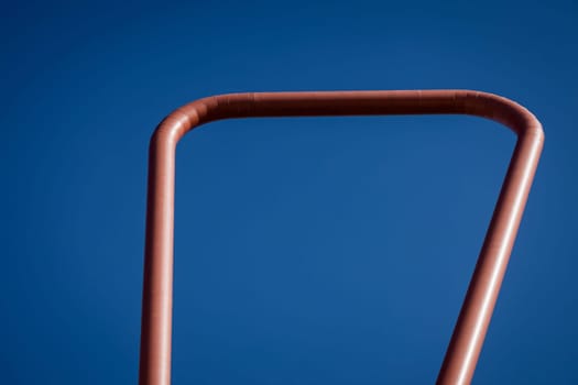 Abstract architectural features. structure of a metal construction with blue sky