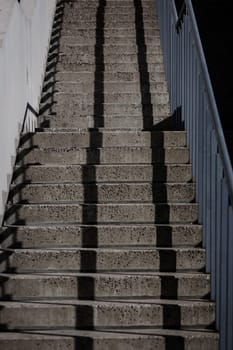 Abstract concrete staircase. Modern design staircase with concrete building.