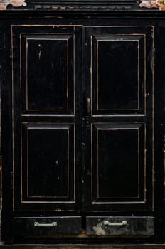 Vintage wardrobe, old furniture. Shabby style interior, furniture. Handmade room style, wood texture. 