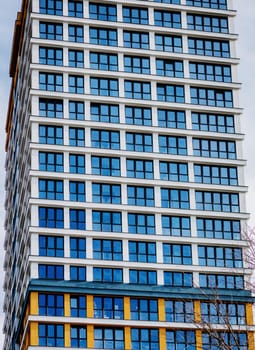 modern residential flat apartment building exterior. Fragment of new luxury house and home complex. Part of city real estate