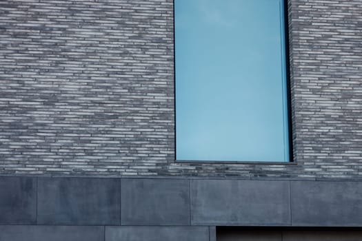 exterior modern brick building with big window