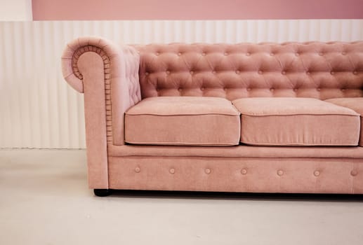 Comfortable couch in chic living room interior. Minimalistic design interior