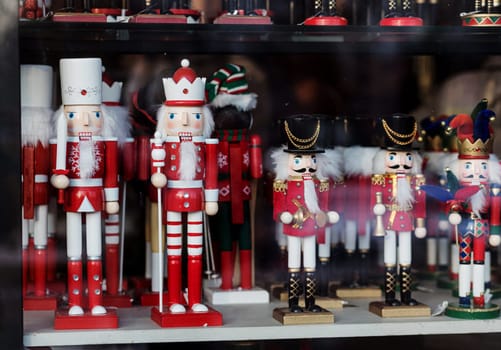 Christmas wooden Nutcracker on the shop window.  Festive soldier 