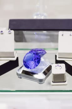 luxurious shiny blue diamond on showcase