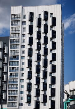 Modern apartment buildings on a sunny day. Facade of a modern apartment building