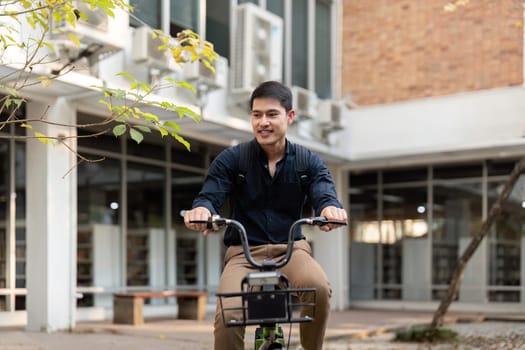 Businessman and bicycle in city to work with eco friendly transport. happy businessman professional riding a bicycle in urban street.