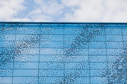 element of modern architecture. stylish blue building against the sky. copy space